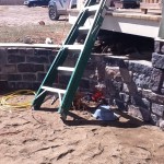 The patio with sand before the paving stones are placed