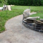 finished patio pathway with retaining wall