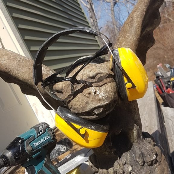 Small gargoyle with safety glasses on